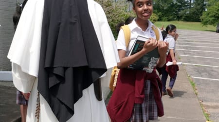 Sister Mary Lawrence dismisses students at St. Paul Catholic School in Whitehaven is not a jubilee school and will be one Catholic School in Memphis that will remain open. © Karen Pulfer Focht