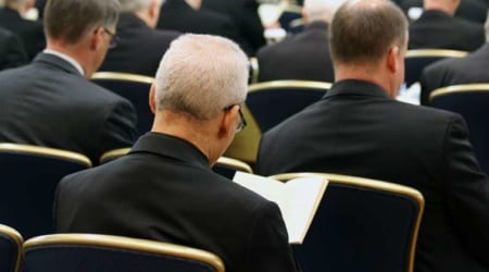 1_USCCB_6_11_Bishop_during_prayer_at_start_of_assembly_Credit_Kate_Veik_CNA