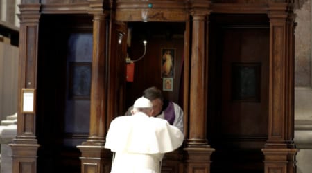A priest hears Pope Francis' confession during a Lenten penance service in St. Peter's Basilica at the Vatican March 29, 2019. In the light of "a worrying negative prejudice" against the Catholic Church, Pope Francis ordered the publication of a document affirming the absolute secrecy of everything said in confession and calling on priests to defend it at all costs, even at the cost of their lives. (CNS photo/Andrew Medichini, pool via Reuters) See VATICAN-CONFESSIONAL-SEAL  July 1, 2019.